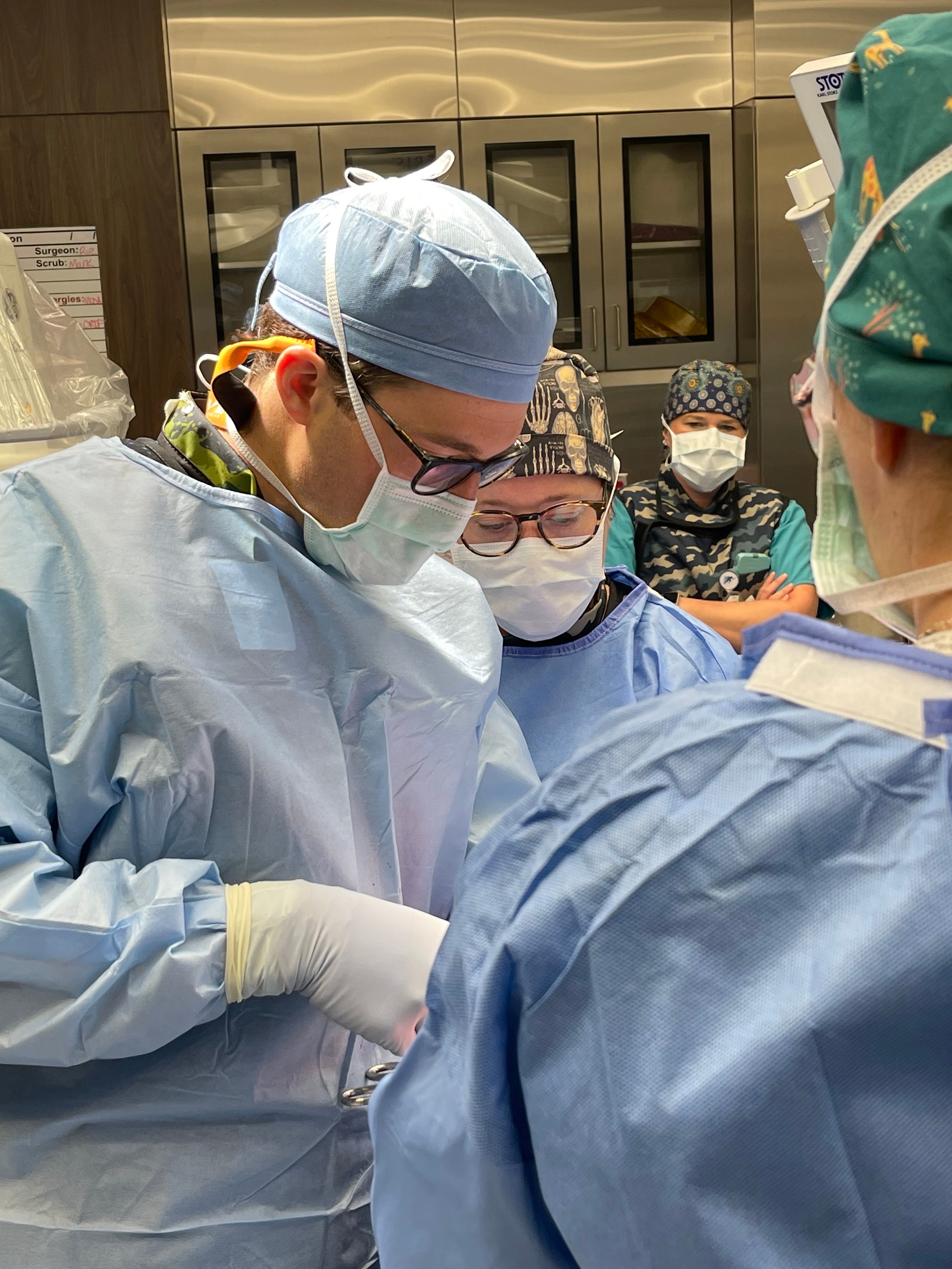 Dr. Joseph J. Ruzbarsky performing surgery in the operating room